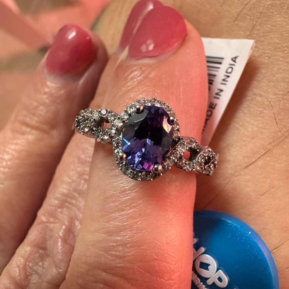 Silver and Blue Tanzanite Ring with Diamond Halo